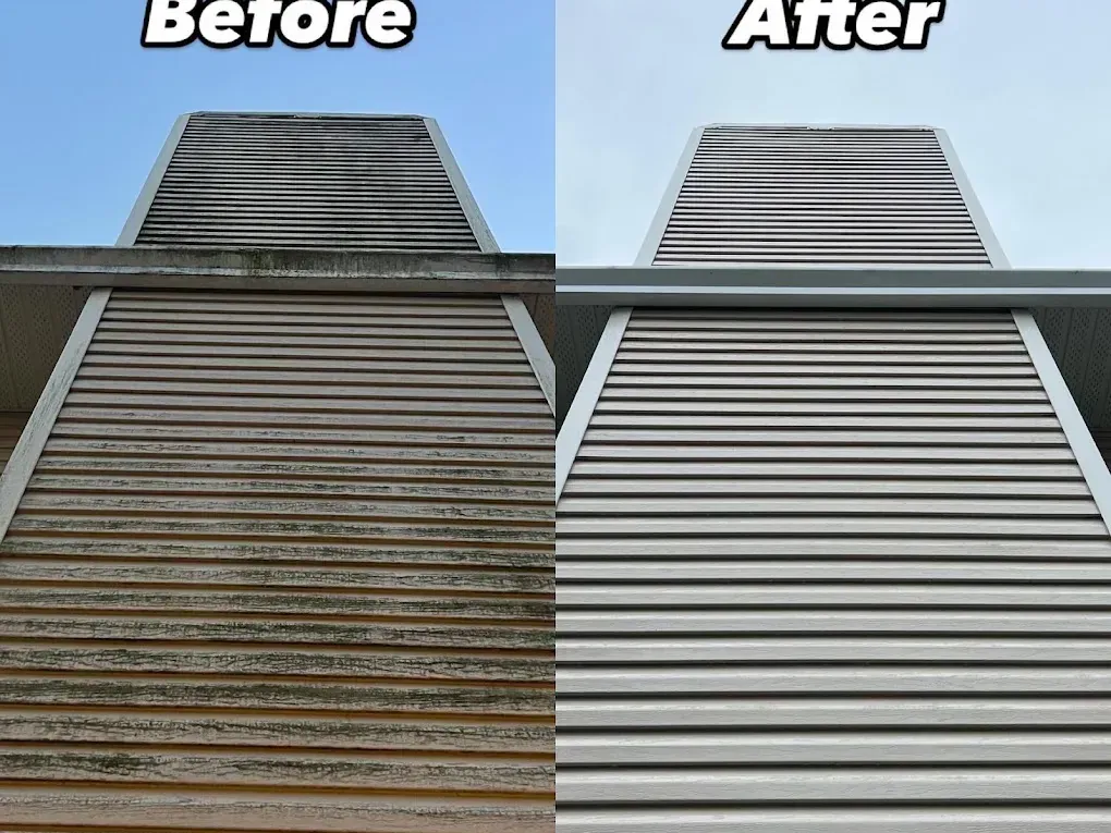 Before and after: streaked horizontal siding on a gable end, cleaned up